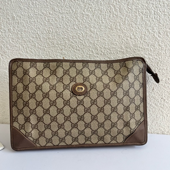 Gucci Brown Monogram vintage unisex clutch purse